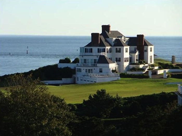 The massive home features eight bedrooms, eight fireplaces, and a pool.