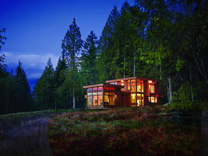 The Halcyon Hill House in British Columbia, Canada features expansive windows, which were pre-cut in the home designer