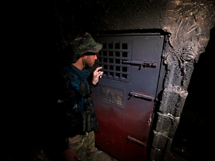 Anti-ISIS forces have also discovered the haunting cells of former ISIS prisons.