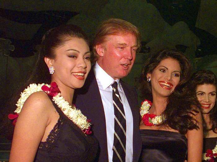 Current President Donald Trump bought a part of the company in 1996. Here he is posing with contestants for Miss Universe in 1998.