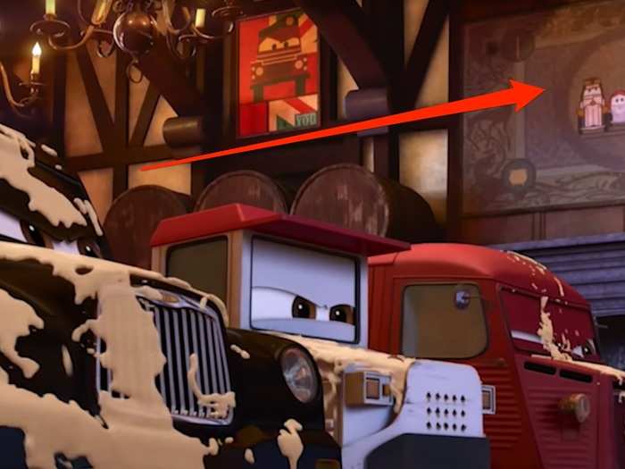 You can see Merida and her parents in the background at one point.