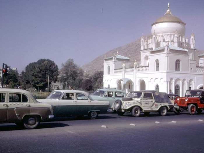 Newly-paved streets were flooded with new cars.