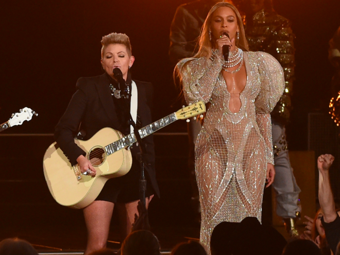 Beyoncé wore this sparkly, large-sleeved gown when she performed with the Dixie Chicks at the 50th annual CMA Awards in November 2016.