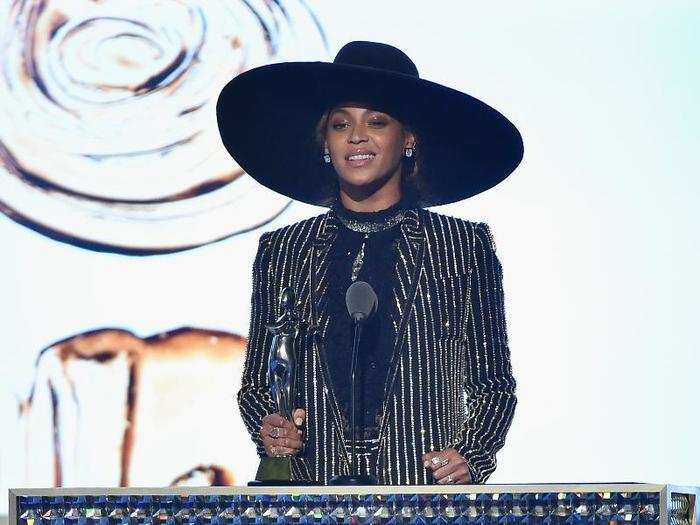 Bey rocked a pantsuit and large hat while accepting the Council of Fashion Designers of America fashion icon award.