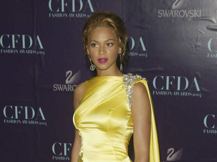 Beyoncé is a huge fan of yellow, wearing it often. Here she is at the 2004 Council of Fashion Designers of America Fashion Awards in 2004. Twelve years later, the group would give her the Fashion Icon award.