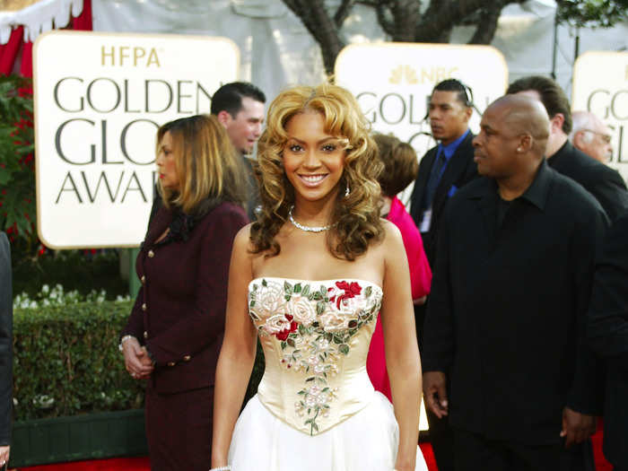 She slayed at the 2003 Golden Globes with this flowery and conservative number.