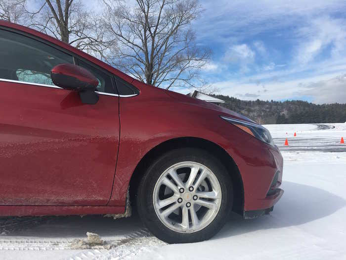 A car understeers because the front tires have lost their grip, so you DON