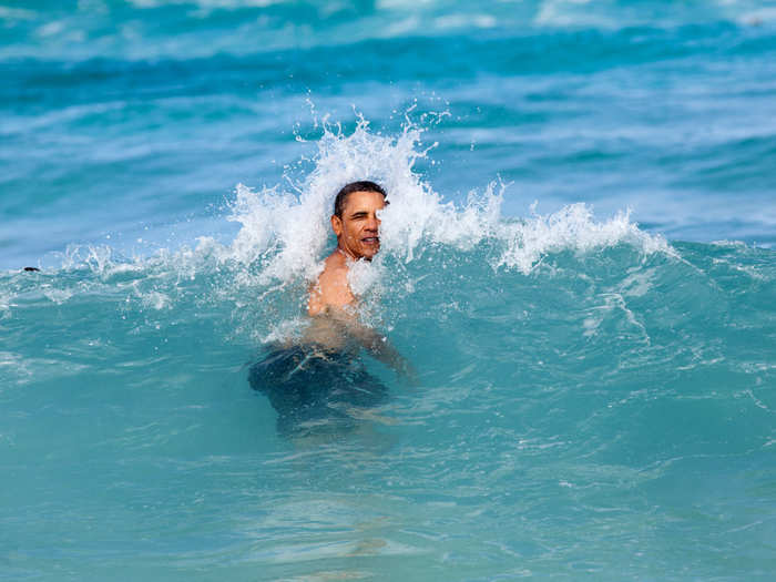 For most holidays, President Barack Obama traveled to his birthplace of Hawaii with his family. Here, Obama celebrated the New Year in 2012 by swimming at Pyramid Rock Beach in Kaneohe Bay.