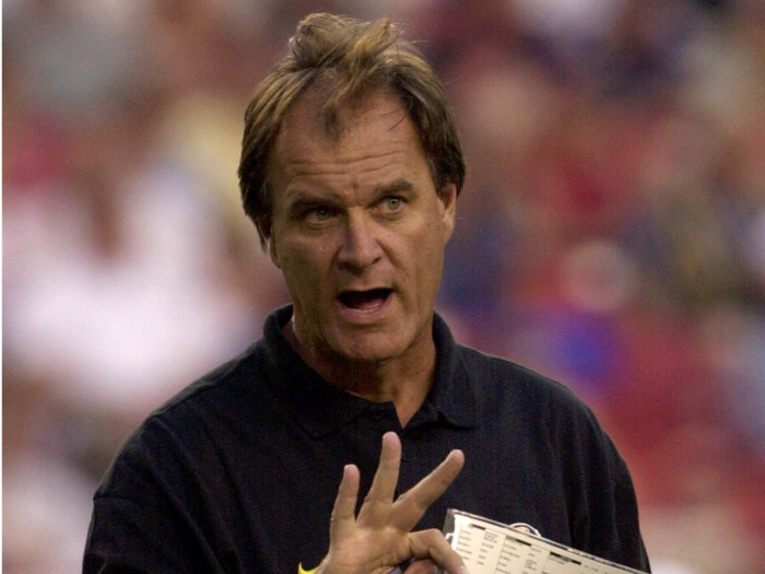 Brian Billick was the head coach of the Baltimore Ravens. They finished the season 12-4.