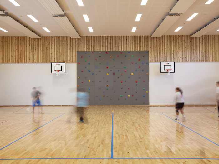 Inmates also have access to a gymnasium with several basketball courts and a rock-climbing wall.