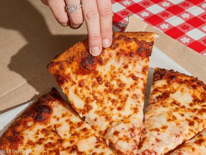 The crust feels crispy, but it has give — a tell-tale sign of a good crust. One bite in and I