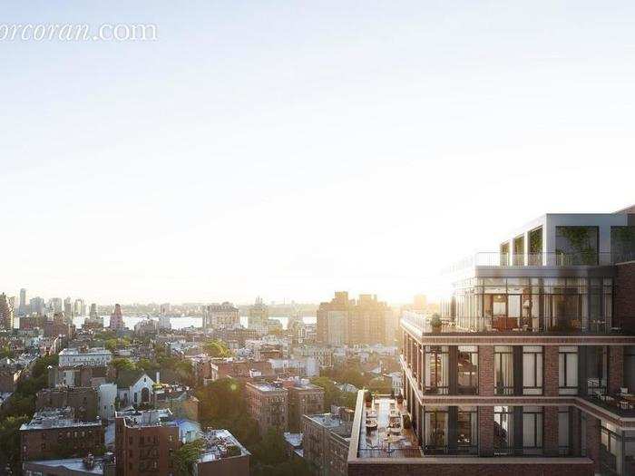 Floor-to-ceiling windows and 1,600 square feet of outdoor space allow residents to overlook much of lower Manhattan and the Hudson River.