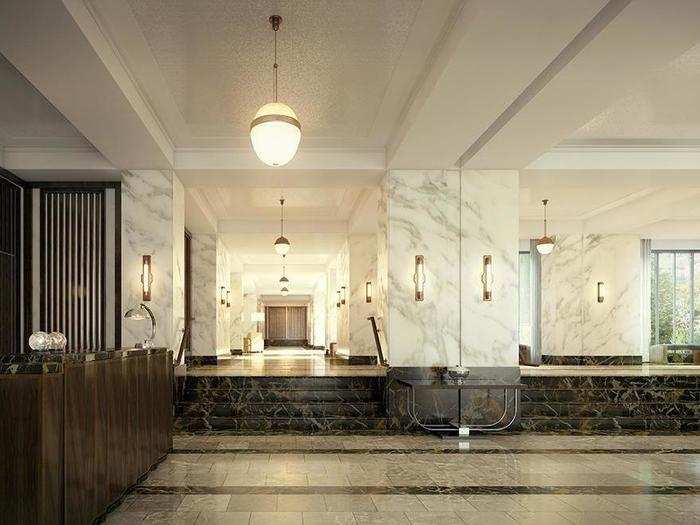 The lobby is well-appointed with marble fixtures.