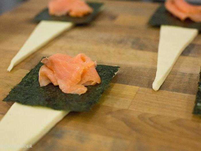 Next, Dunn piled on pickled ginger and Norwegian smoked salmon. "We don