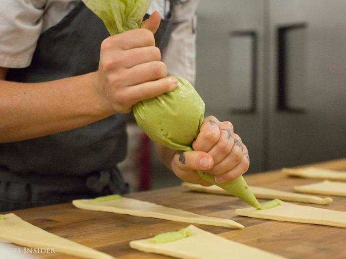 Before we gave the California croissant a taste, Dunn led us into the kitchen to see how the pastry is made. The chef piped a stripe of wasabi along the pastry