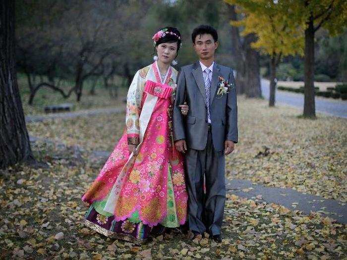 The traditional Korean costume, called the hanbok, has been worn by brides for thousands of years. It includes a long-sleeved jacket and a high-waist skirt made of cotton or silk.