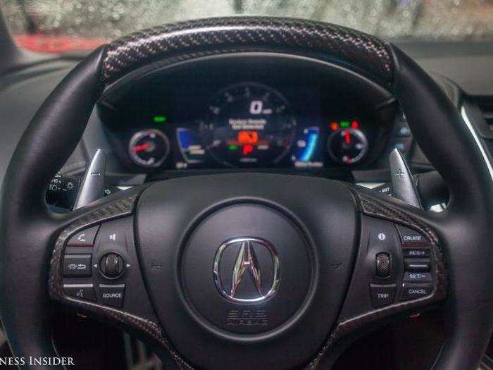 The instrument cluster is fairly straightforward. The visual changes depending on which driving mode is selected.