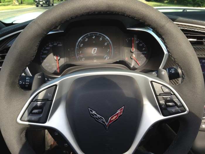 What the driver sees when he takes the wheel is fairly straightforward. Analog gauges with some useful controls on the steering wheel: audio system (it