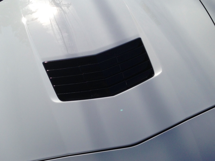 A hood scoop with slotted venting.