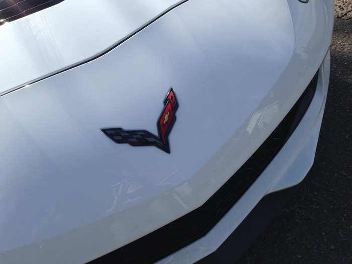 The Corvette badge appears in a bunch of places, such as on the hood ...