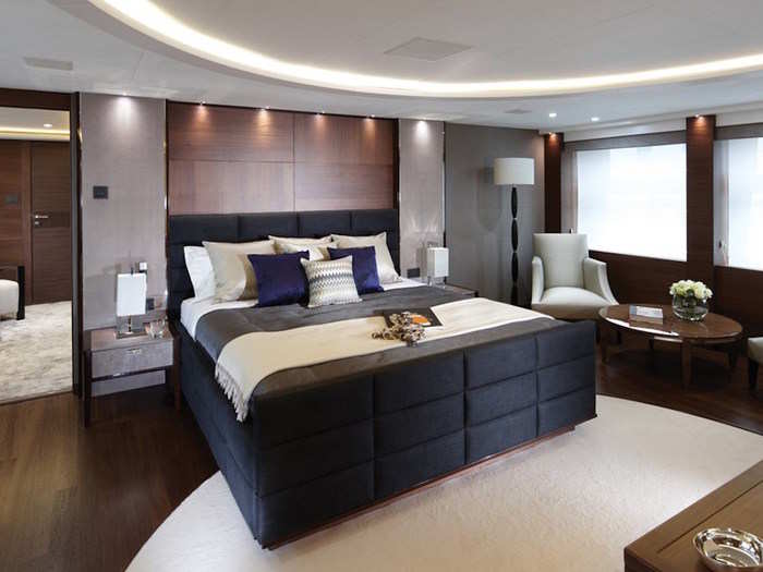 The yacht has five cabins, including the master suite pictured here. On the left you can see the master bedroom, which comes with its own office space.