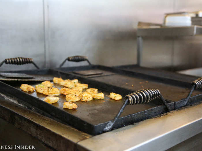 The cook seared the tilapia on a comal, a kind of pan that a member of the kitchen staff compared to "Mom