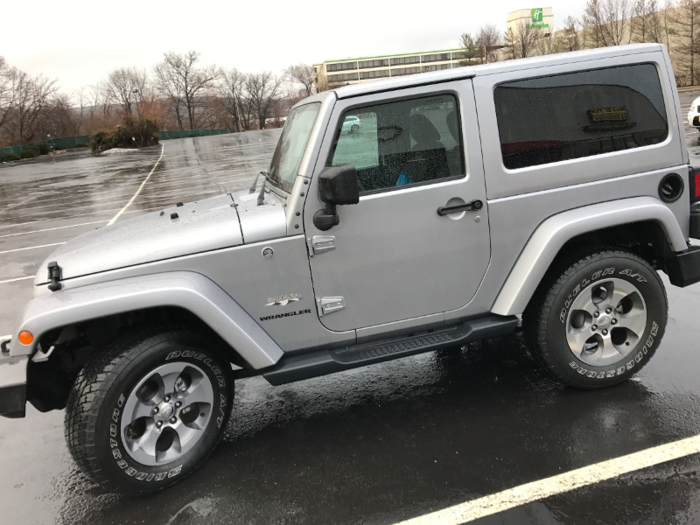 Our tester came with a "Silver Metallic" paint job, a basic-black interior, two doors, an nearly inaccessible back seat, and a $2,000-extra hardtop that can be disassembled. The doors can also be removed, by the way.