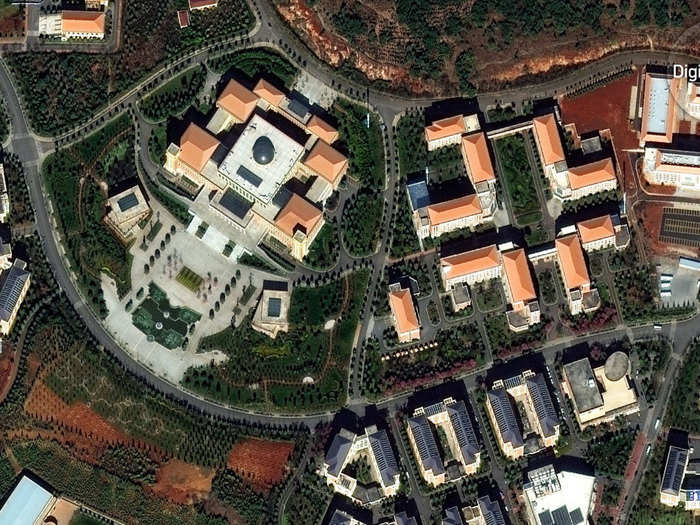 Chenggong has several big new university campuses. This has sat mostly empty and unfinished for a while, according to DigitalGlobe.