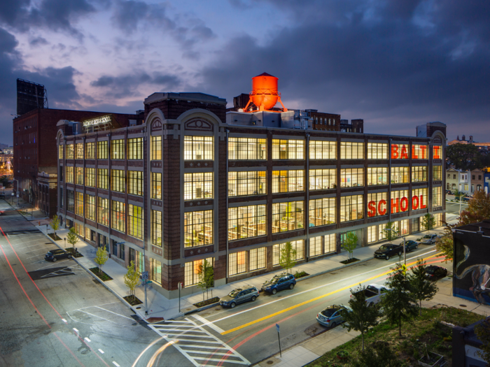 Renovated from an old factory from 1914, the Baltimore Design School in Maryland repurposes the vast space as a middle and high school.