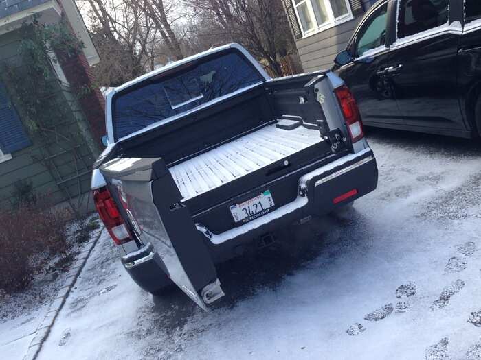 The Ridgeline does have a cool side-swinging gate, however.