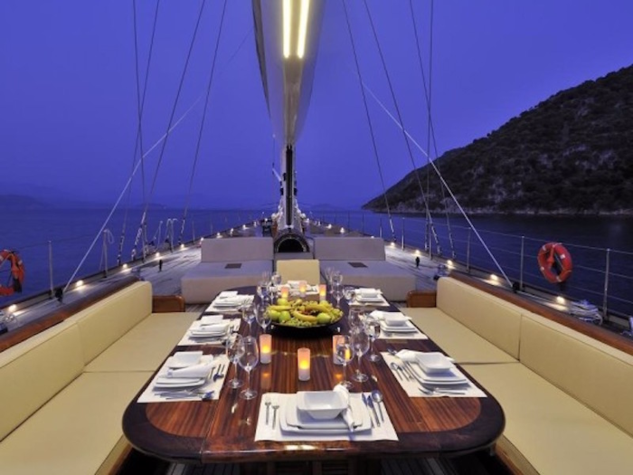 A table on the deck also has room for all the guests on board.