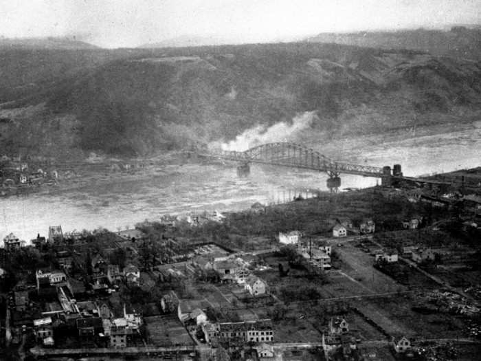 American troops fanned out on the east side of the bridge, securing the surrounding area. Some members of the bridge