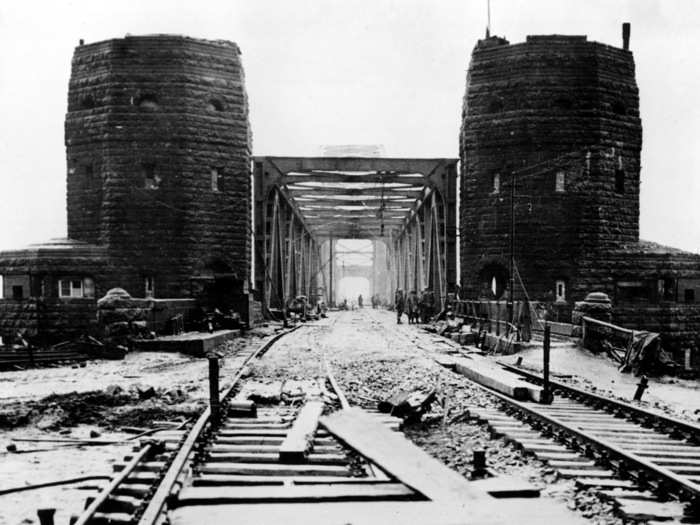 Timmerman and his troops advanced through the town of Remagen on the western side of the river, fighting off German defenders. German soldiers on the bridge prepared the numerous demolition charges they had planted to destroy the bridge.