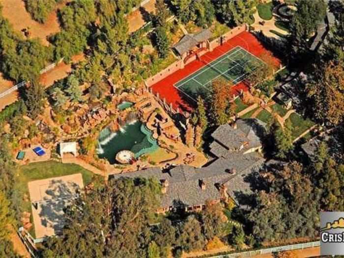 This aerial shot gives you a sense of the enormous size of the house ... and especially of that pool.