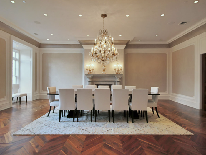 The formal dining room has been outfitted with a large wooden table that can seat up to 12. Diners can choose between enjoying a meal here or on one of the dining terraces throughout the property.