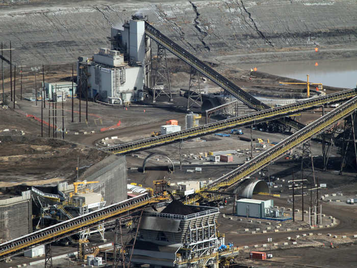 The conveyors take the sand to be conditioned — the first step in separating it from the oil.