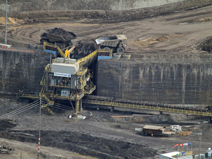 ...To crushing plants like this, which break up the chunks into a fine mixture that can be transported along the conveyor belts below.