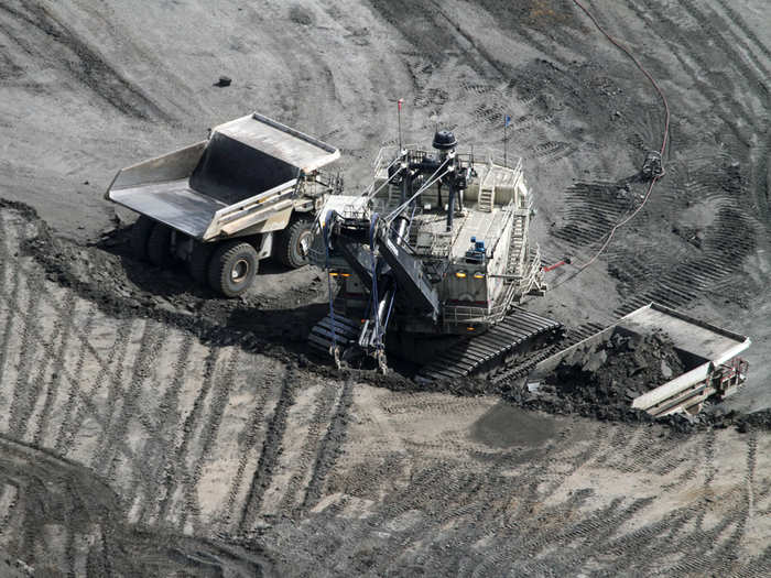 The Cat 797 dump trucks are the largest in the world and can haul 1 million pounds in a single load — more weight than a fully loaded Boeing 747 airplane.