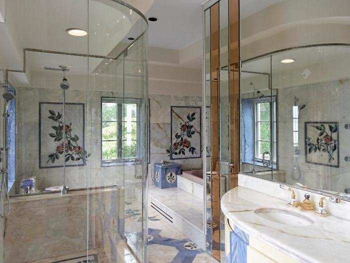 The bathrooms are also custom-built, with lots of glass and marble.