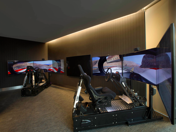 ... and a game room complete with golf and racing simulators.