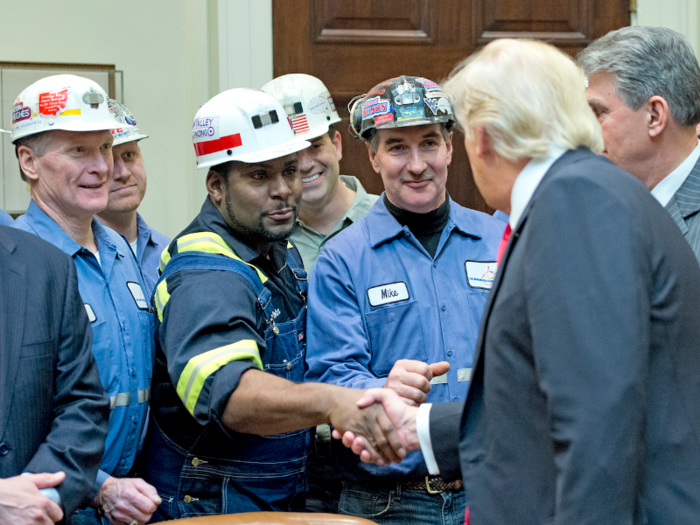 Trump signs an executive order rolling back key Obama-era climate policies, including the Clean Power Plan.