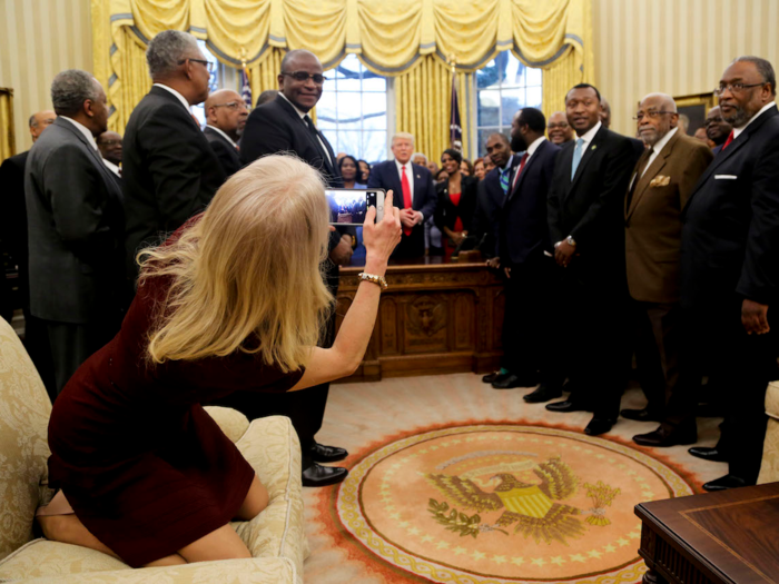 Kellyanne Conway provokes outrage after being photographed sitting casually with her feet on an Oval Office couch.