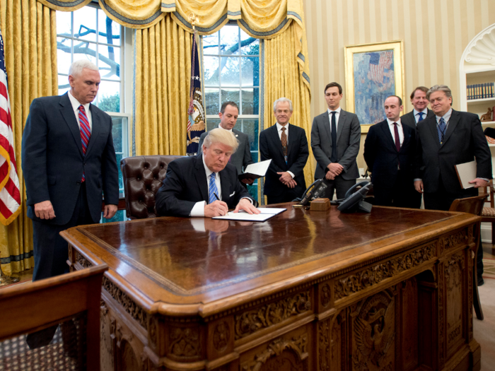 Trump signs an executive order withdrawing the US from the Trans-Pacific Partnership, a multilateral trade agreement.