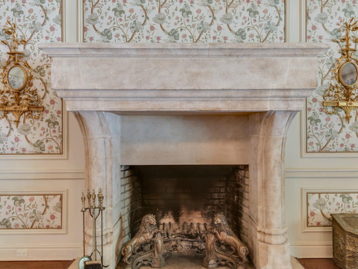 It has a large, hand-carved stone fireplace ...