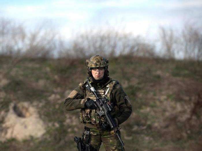 Romanian Navy Sgt. Ramona Griguta poses during Spring Storm 2017. By 2008, more than 50 Romanian women had served in combat roles in Iraq and Afghanistan.