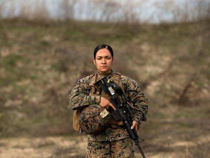 US Marine Sgt. Elia Balbaloza, part of the Female Engagement Team, poses during a live-fire training exercise in Romania.