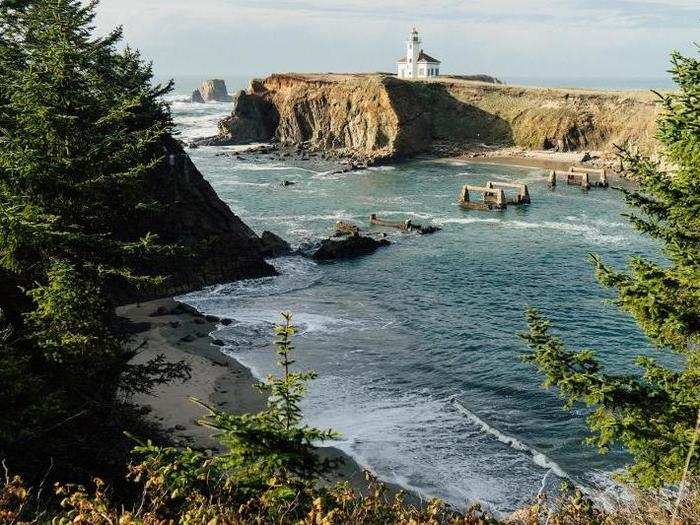 ... and hopped fences to capture the perfect photo of a lighthouse in Coos Bay, Oregon.