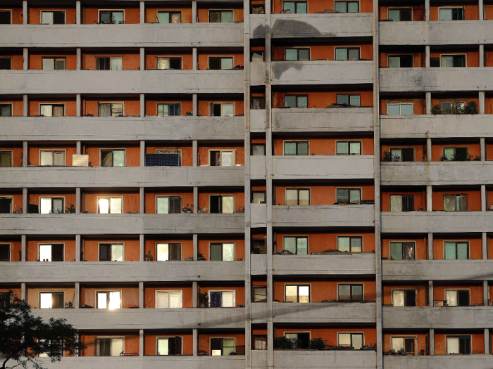 Many North Koreans live in densely-packed high-rise apartments such as this one. Many buildings see frequent shortages in electricity and elevator breakdowns.