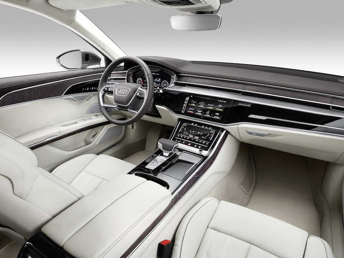 The driver can control the infotainment system using the sedan