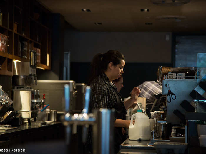 Dim lighting casts a yellowish, moody hue over the store.